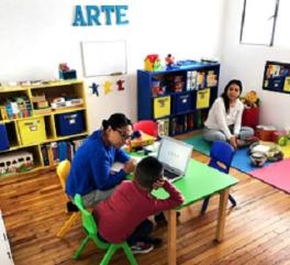 World Language Professional in a art classroom teaching children