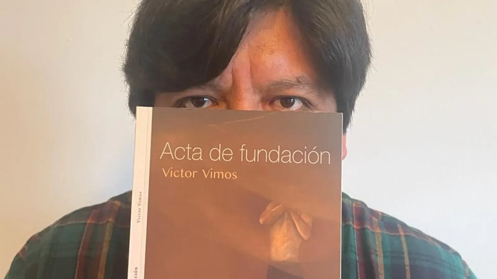 Victor Vimos Vimos and his poetry book