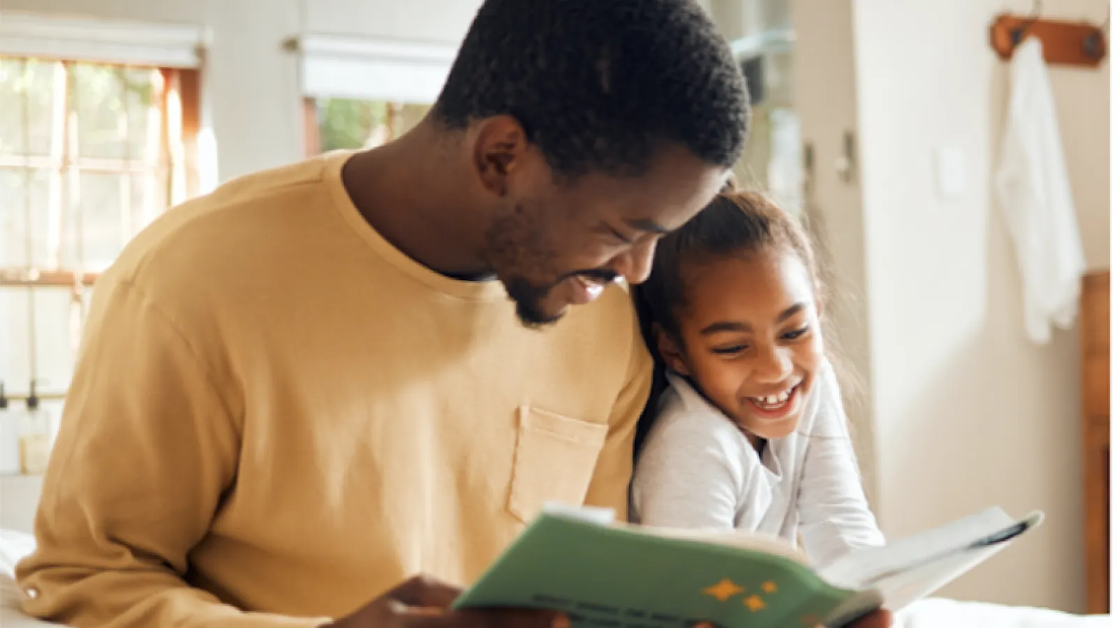 Father & Daughter reading book