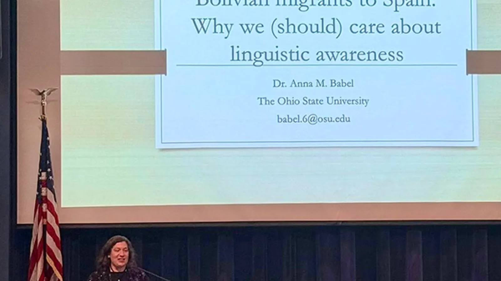 Anna Babel at Podium speaking