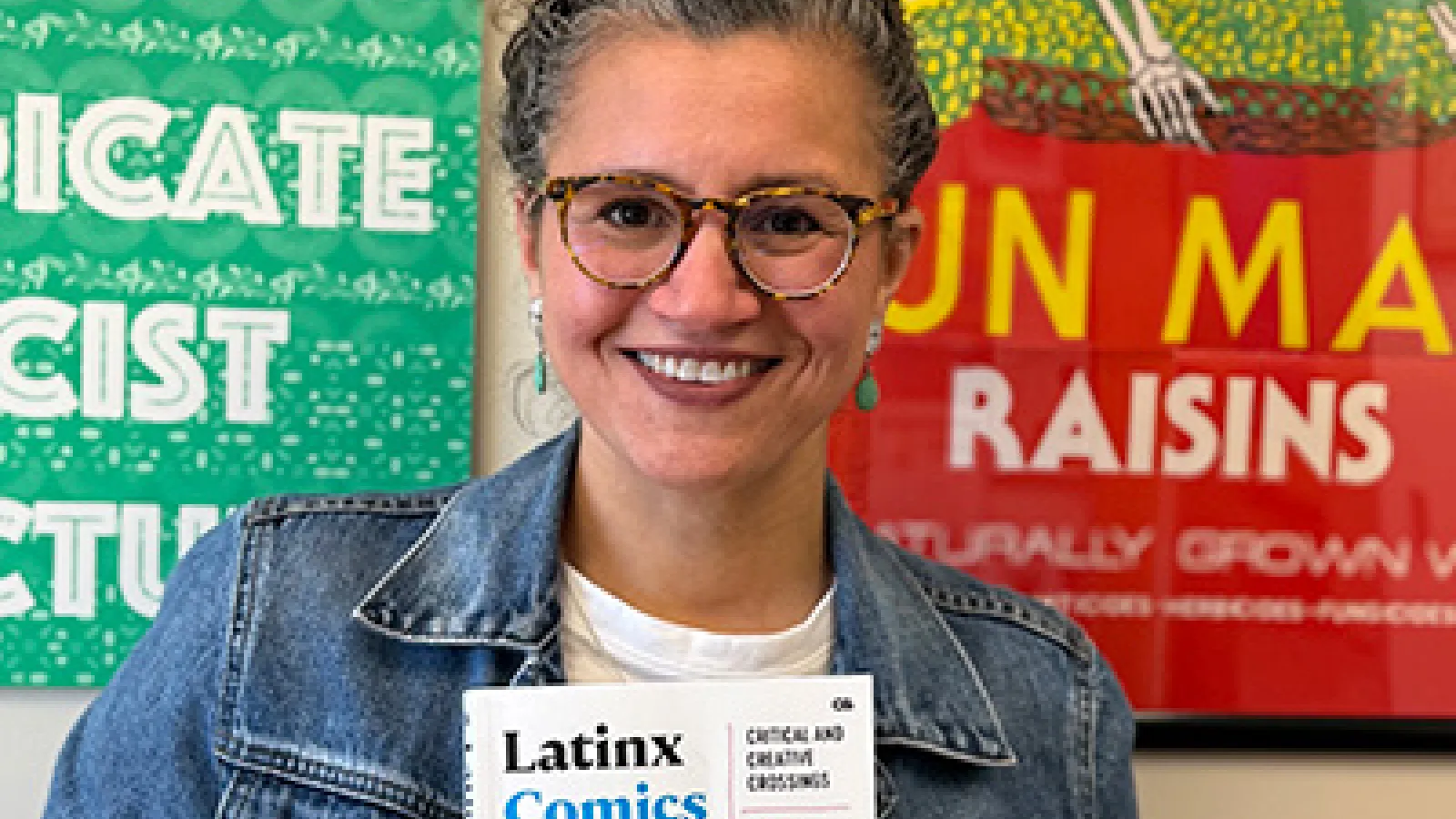 Fernanda holding her book 