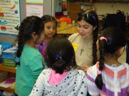 OSU Student Reading Storybook to Several Salem Elementary Students