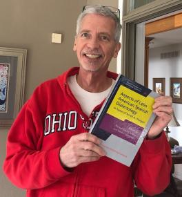 Dr. Terrell Morgan with edited volume of "Aspects of Latin American Spanish Dialectology"