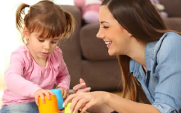 child playing with adult 