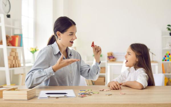 speech pathologist working