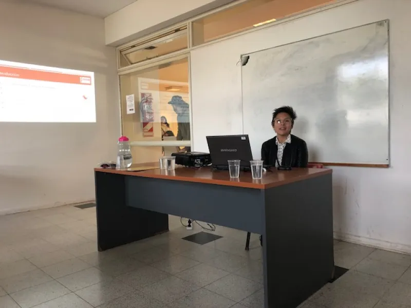 Grad student Palo Pinillos Chavez presenting in Buenos Aires