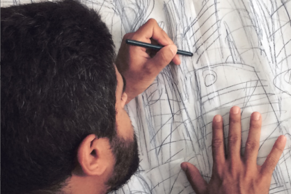 Hugo Canuto working on his art. Image courtesy of Hugo Canuto's website.