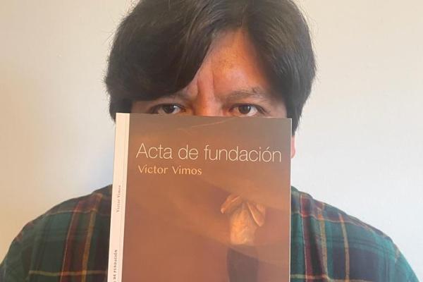 Victor Vimos Vimos and his poetry book