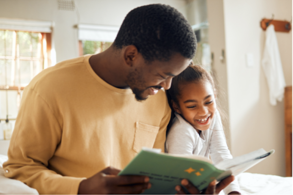 Father & Daughter reading book