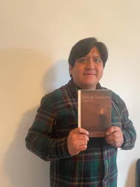 Victor Vimos Vimos and his poetry book